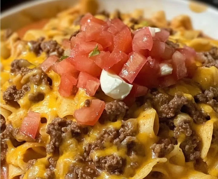 If you love tacos and pasta, this Cheesy Beef Taco Pasta is the ultimate comfort food mashup! Packed with seasoned beef, creamy melted cheese, and a kick of Rotel, it’s a quick and hearty meal the who...