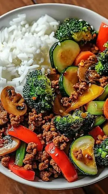 Spicy Ground Beef Stir-Fry Bowl with Garlic Veggies & Steamy Rice