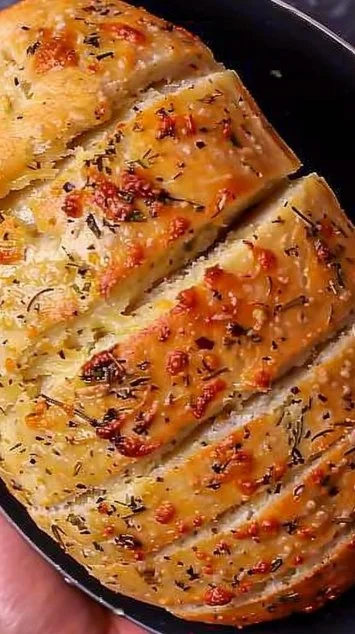 Homemade cheesy garlic bread recipe made in a pressure cooker