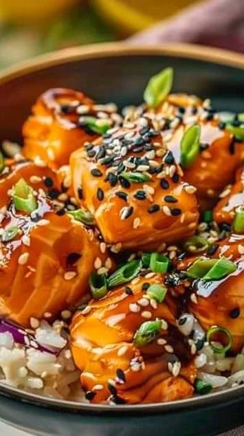 Crispy salmon and rice bowl with vegetables and sauce