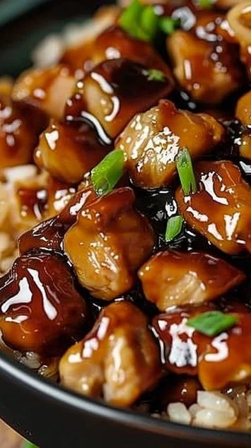 Delicious Honey BBQ Chicken Rice served on a plate with vibrant vegetables