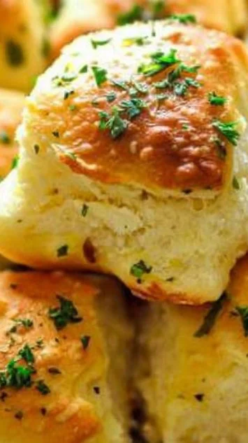 Delicious pull apart garlic bread fresh out of the oven, golden and cheesy.