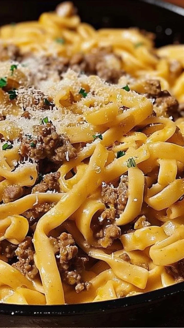 One-pot creamy beef and garlic butter pasta dish with fresh herbs and cheese
