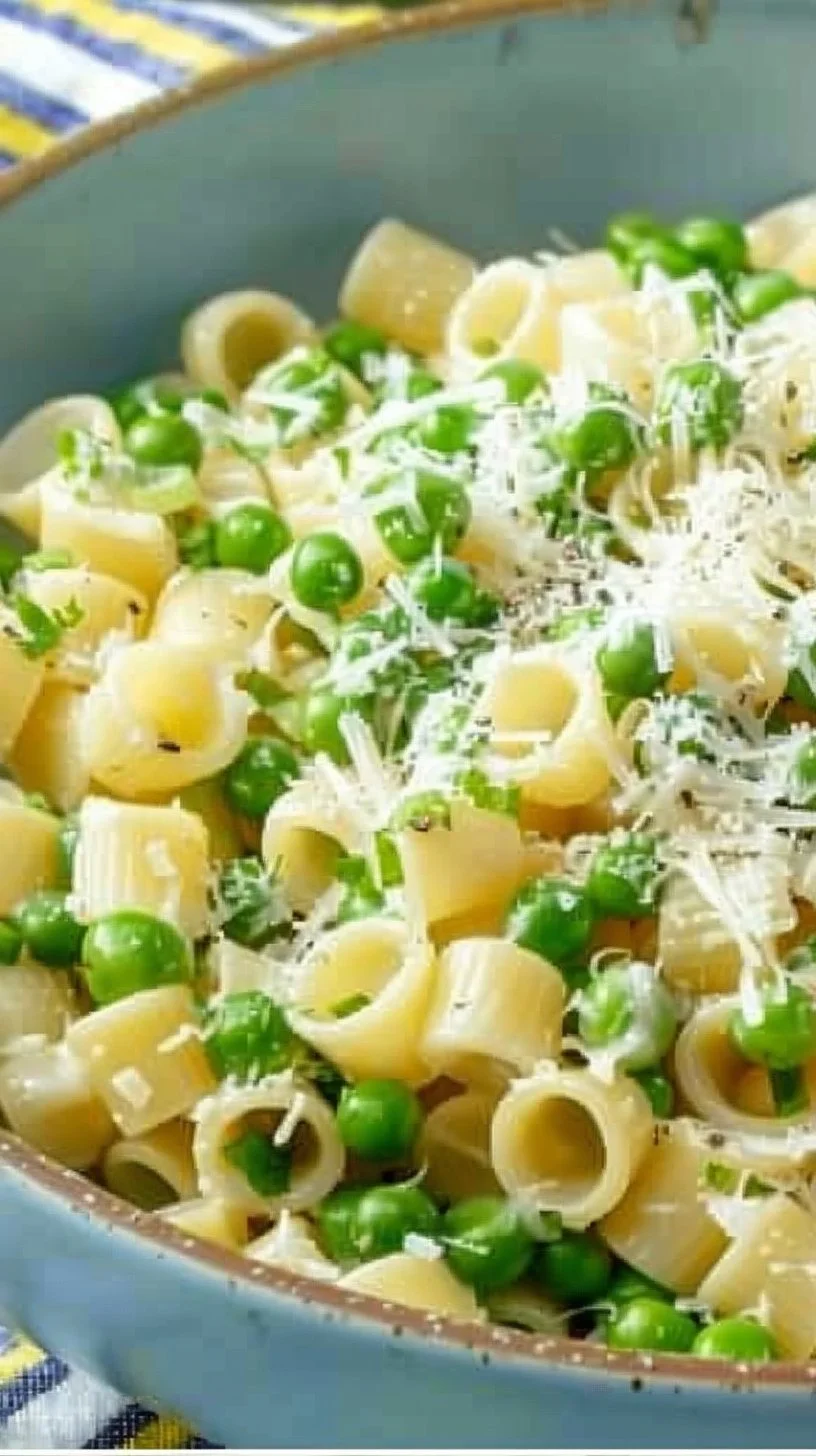Delicious plate of pasta and peas garnished with fresh herbs